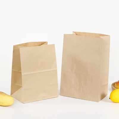 El papel plano maneja la bolsa de papel Kraft para llevar de la comida rápida para llevar de Brown para el empaquetado del restaurante